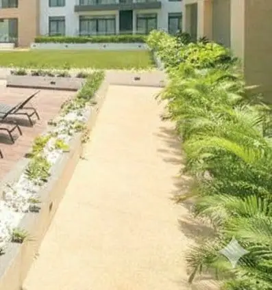 Landscaped garden walkway at Embassy Gardens